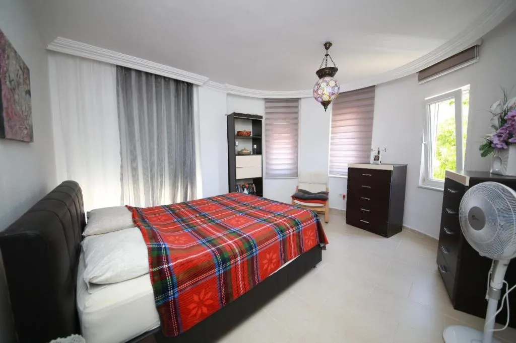 Villa Bedroom Red Blanket